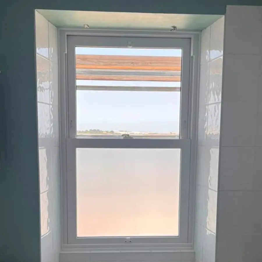 Sash window with a view of the sea